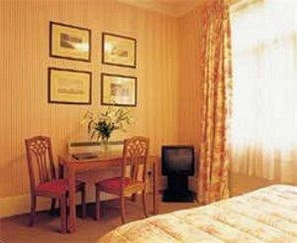Astons Apartments Londra Cameră foto